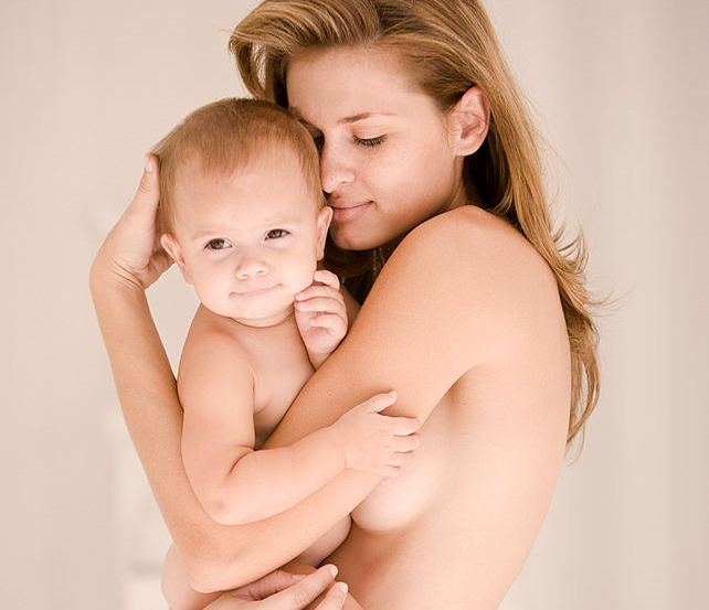 Image of woman holding a child